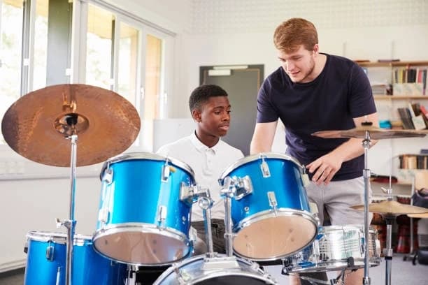 Rhythms for Life: Teaching Drums to Kids vs. Adults
